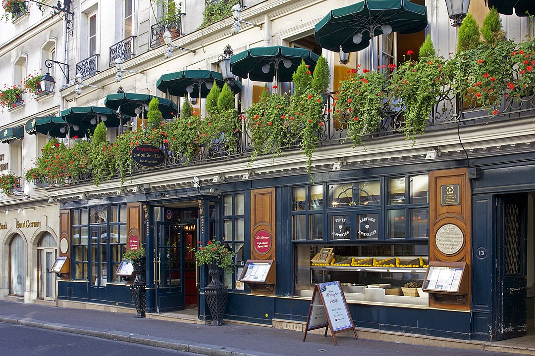 13 Iconic Parisian Cafés That Will Make You Feel Like You're in a Movie